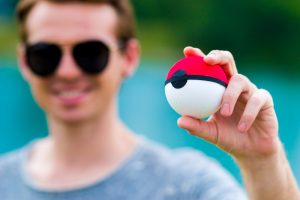 A loyal Pokemon fan holding a Pokeball